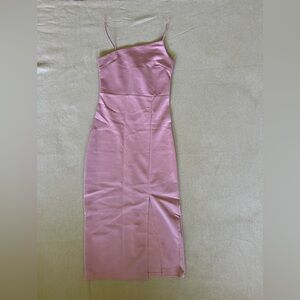 Brand new spaghetti strap x’s tight fitting dress.
